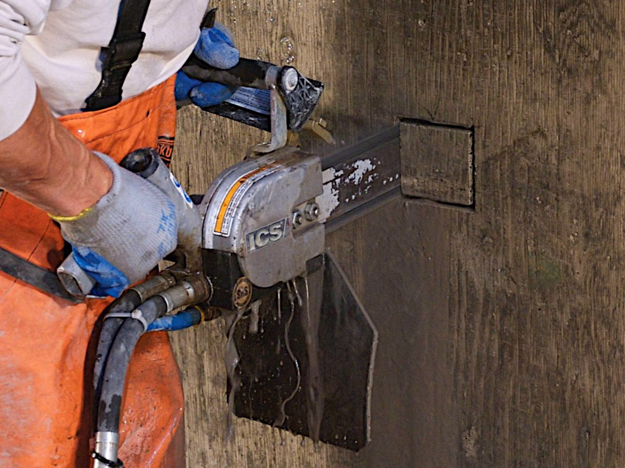 chain sawing concrete in los angeles by intracut - close up view #1