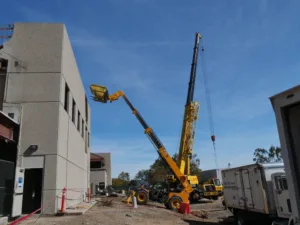 reach forklift removing panel for takeda pharmaceuticals demolition project - pic 2